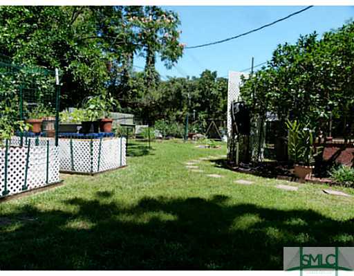 12708 Sunnybrook Road Savannah, GA 31419 - Photo 22 of 25 Yard/Garden. Beautifully Landscaped Backyard!