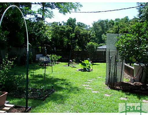 12708 Sunnybrook Road Savannah, GA 31419 - Photo 23 of 25 Yard/Garden. Beautifully Landscaped Backyard!