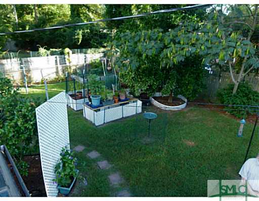 12708 Sunnybrook Road Savannah, GA 31419 - Photo 25 of 25 Yard/Garden. Beautifully Landscaped Backyard!
