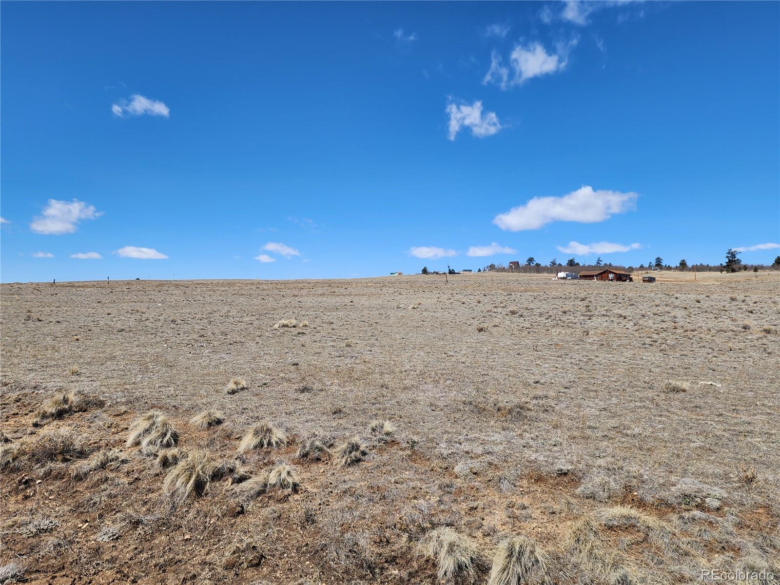 123 Jims Way Como, CO 80432 - Photo 3 of 10 a view of ocean and sunset
