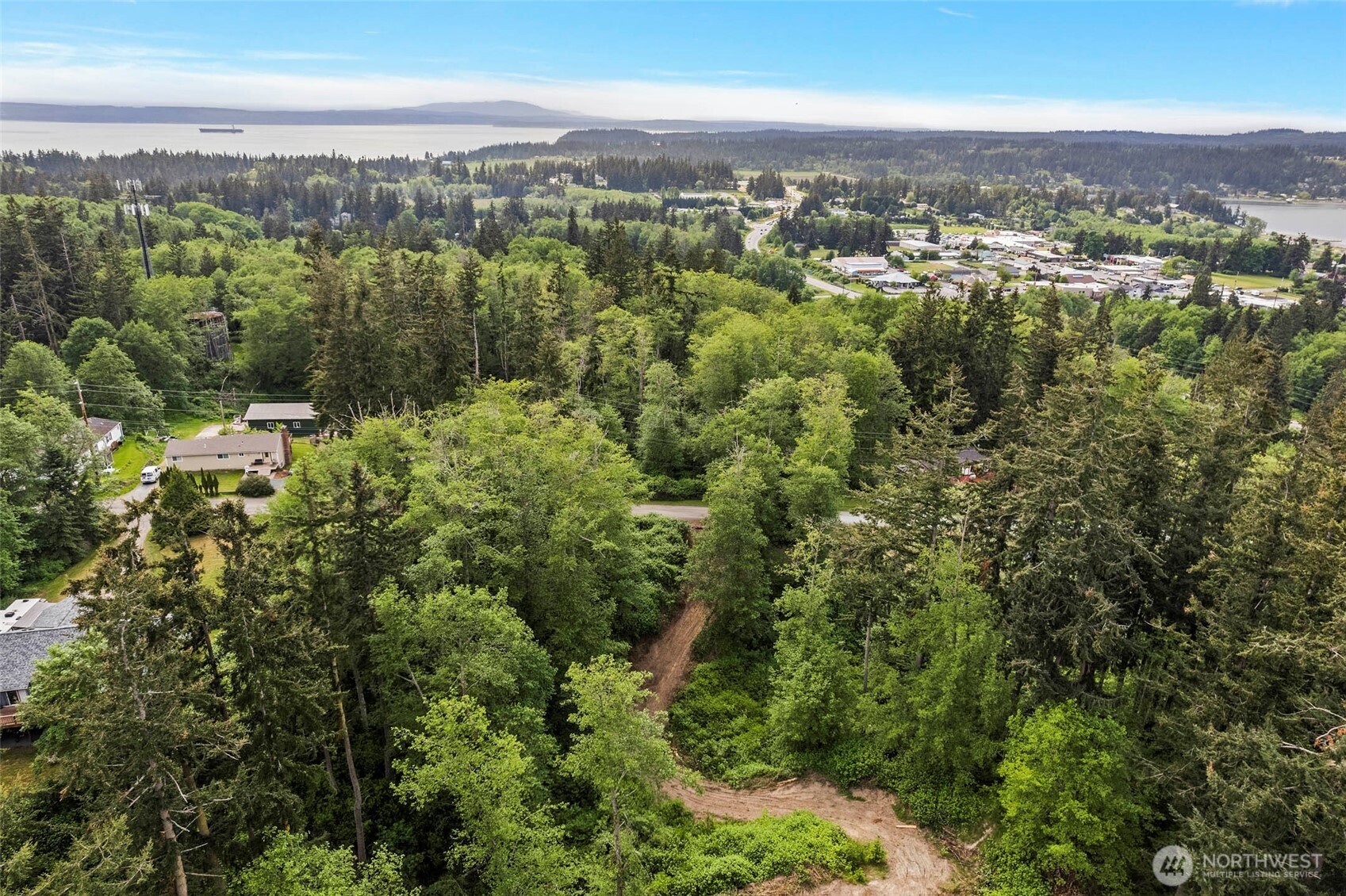 -xxx Osprey Road, Unit 152 Freeland, WA 98249 - Photo 6 of 14 an aerial view of residential house with outdoor space