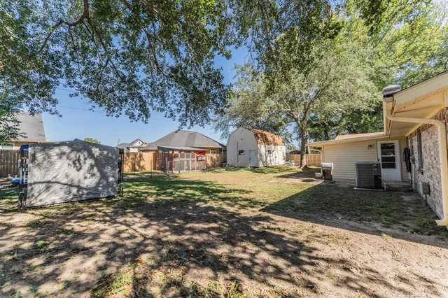 a view of a backyard with a garden