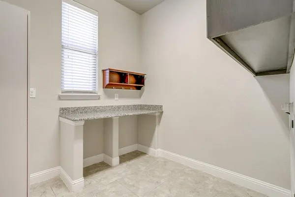 a kitchen with a stove and a microwave