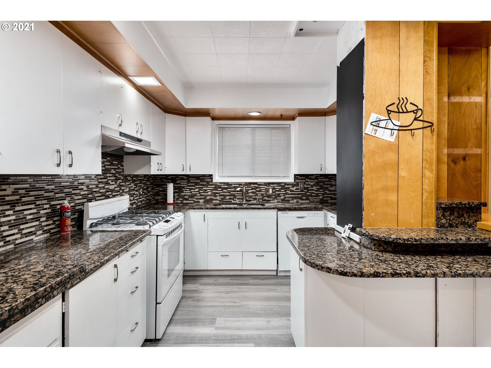 84832 Edenvale Road Pleasant Hill, OR 97455 - Photo 6 of 32 a kitchen with stainless steel appliances granite countertop a sink stove and cabinets