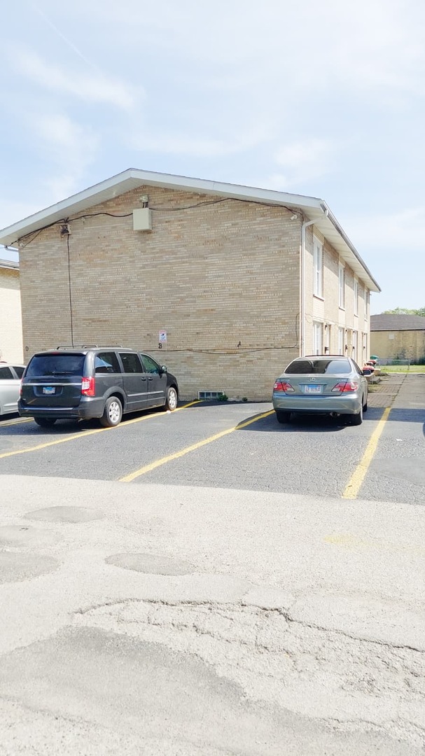 2204 Hebron Avenue, Unit B Zion, IL 60099 - Photo 5 of 13 a view of car parked on the side of the road