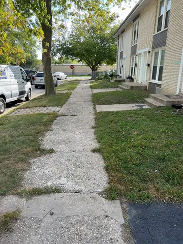 a view of a swimming pool with an outdoor space