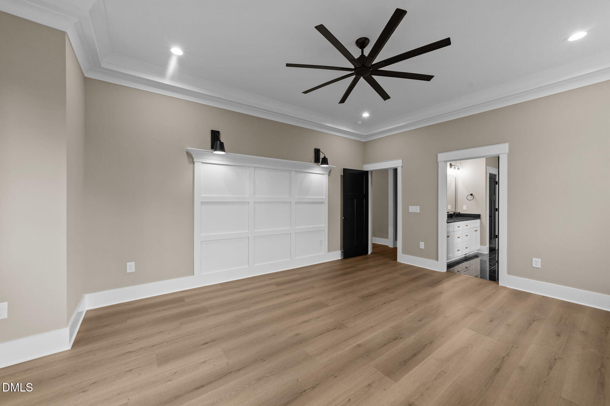 2590 Lassiter Road Four Oaks, NC 27524 - Photo 35 of 72 a view of empty room with wooden floor and ceiling fan