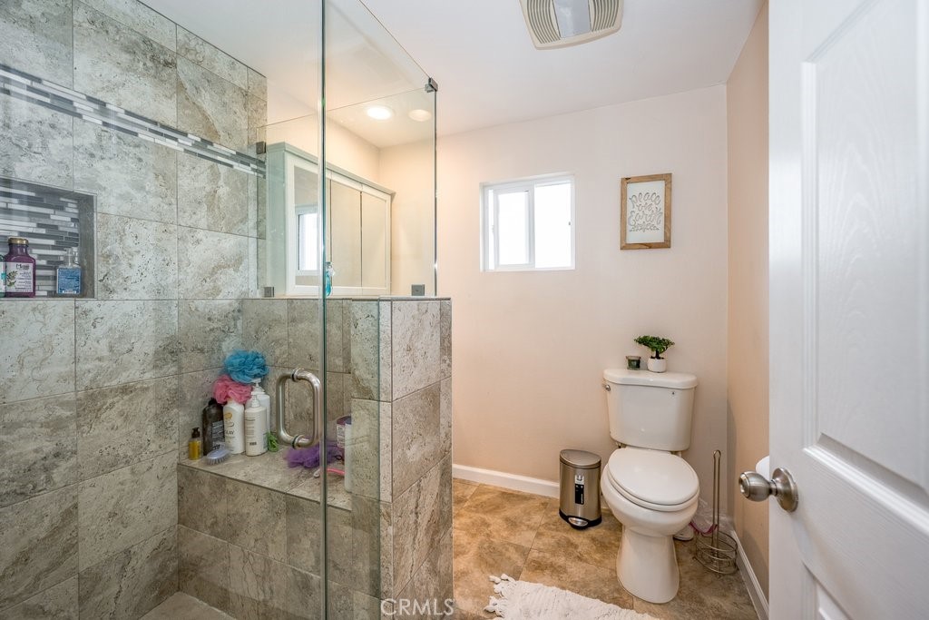 6834 Quinton Lane Tujunga, CA 91042 - Photo 12 of 22 a bathroom with a toilet sink and shower