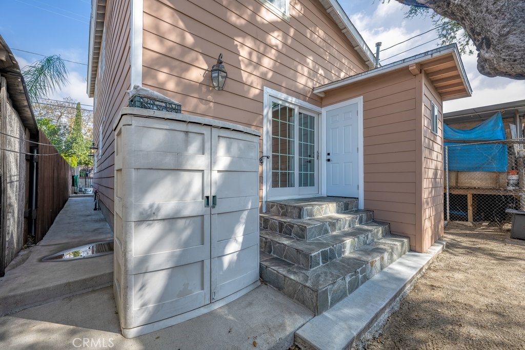 6834 Quinton Lane Tujunga, CA 91042 - Photo 21 of 22 a view of a brick house with a large windows