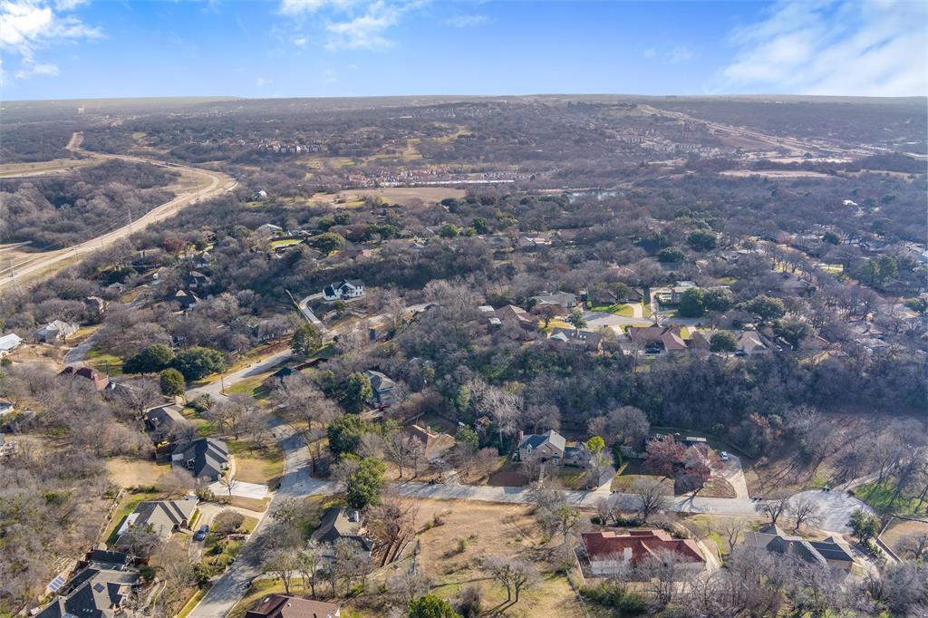 304 Willow Ridge Court Fort Worth, TX 76103 - Photo 4 of 22 an aerial view of house with yard and mountain view in back