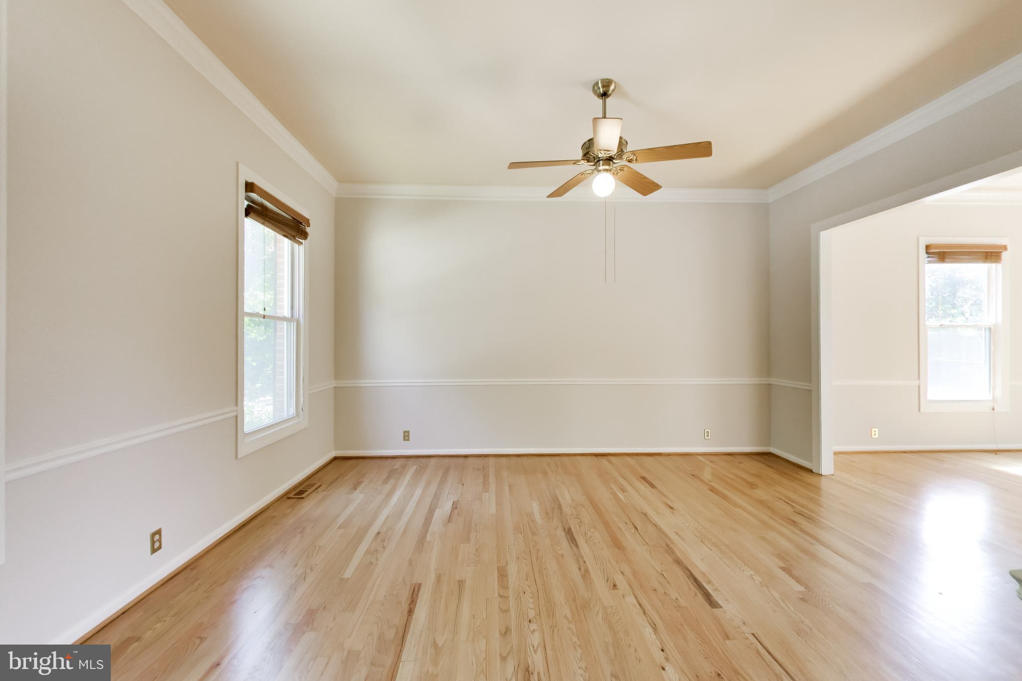 11906 Claridge Road Silver Spring, MD 20902 - Photo 5 of 41 Living room with hardwood floors and ceiling fan