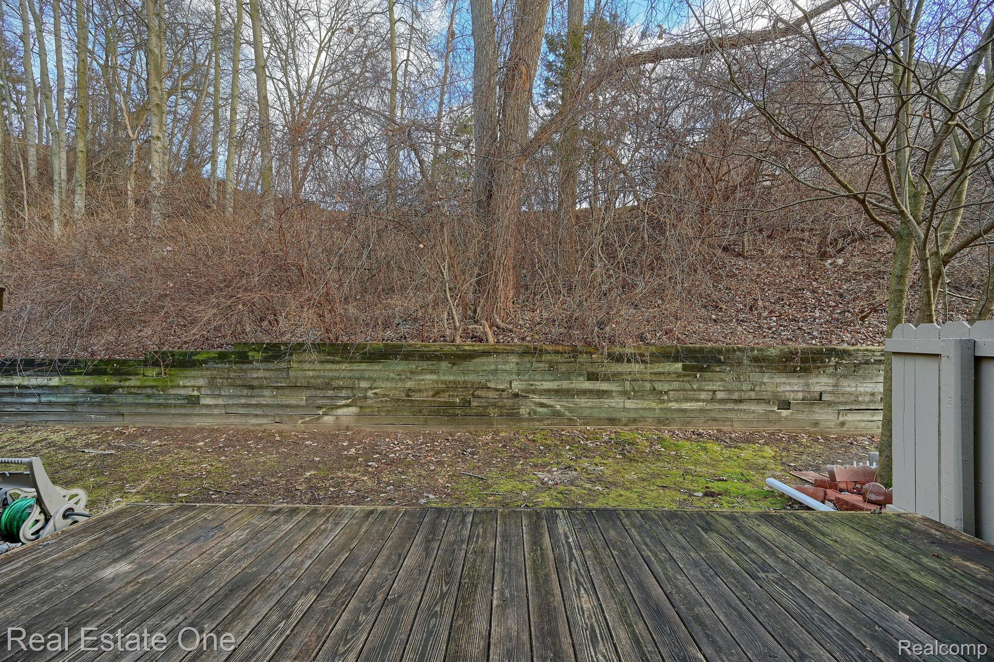 1372 Crescent Lane, Unit 301 Rochester, MI 48306 - Photo 27 of 41 Desirable Wooded views from Deck