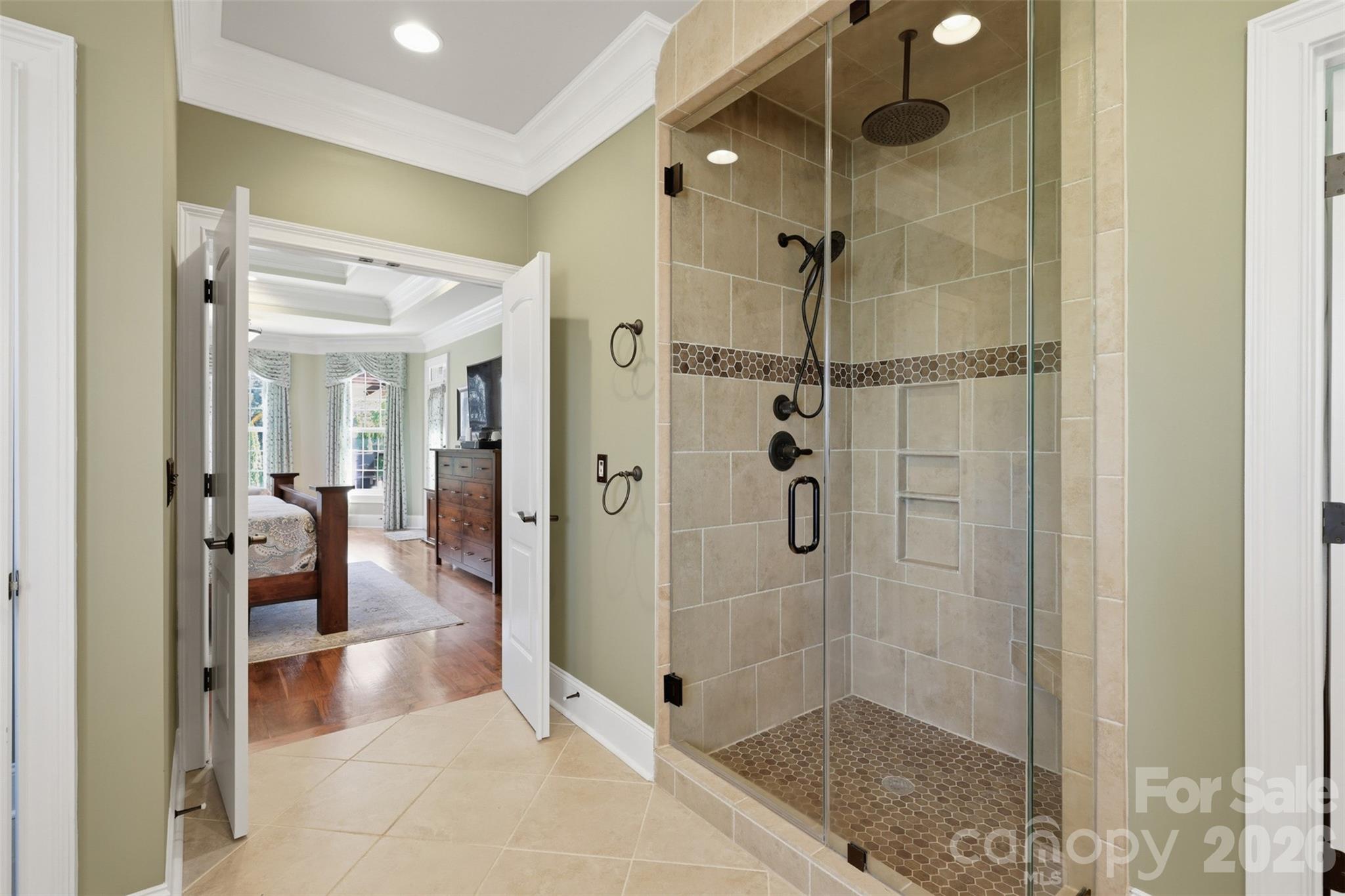 3638 Hogan Court Conover, NC 28613 - Photo 20 of 38 a bathroom with a glass shower door