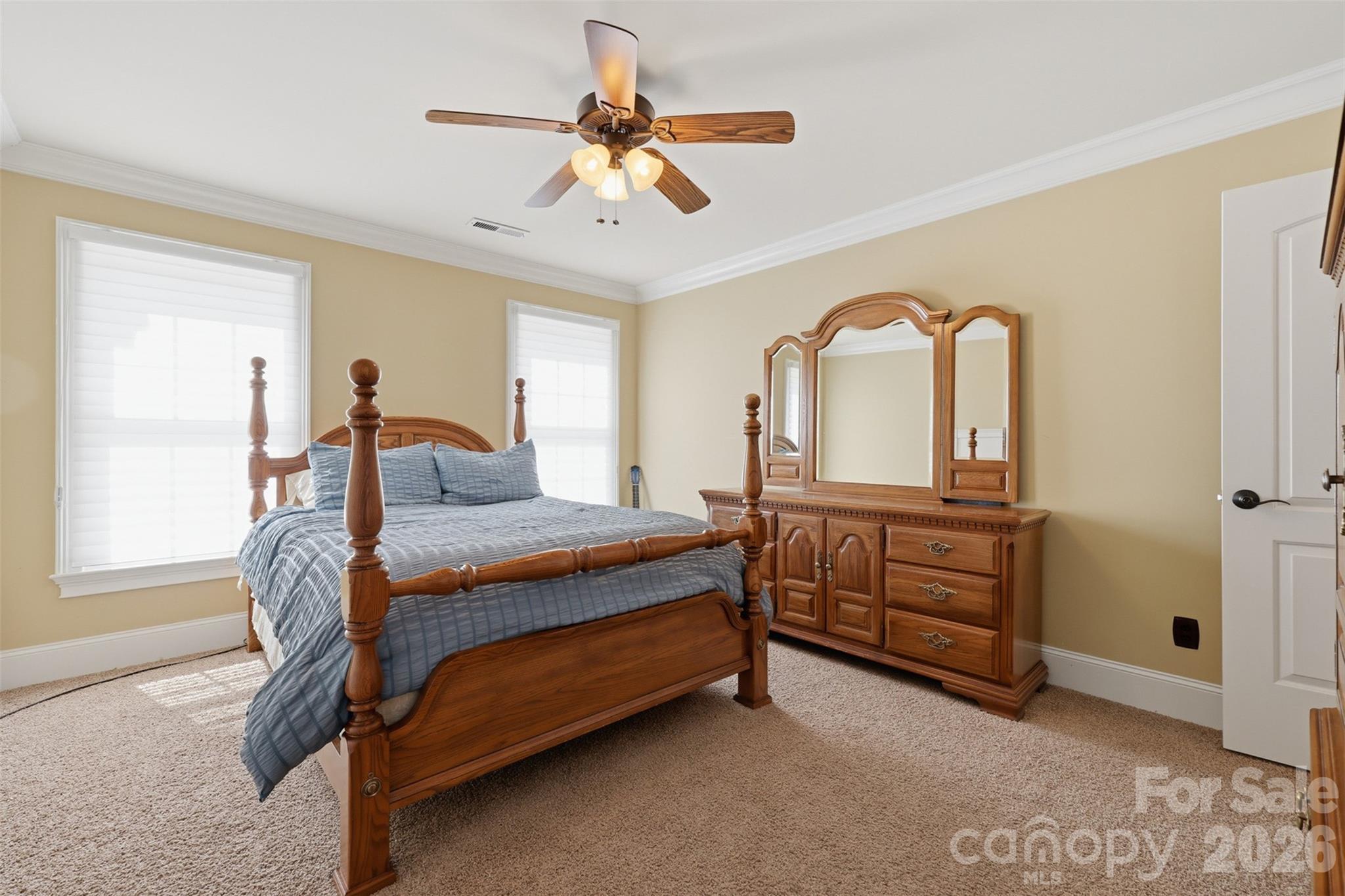 3638 Hogan Court Conover, NC 28613 - Photo 25 of 38 a bedroom with a bed and a dresser