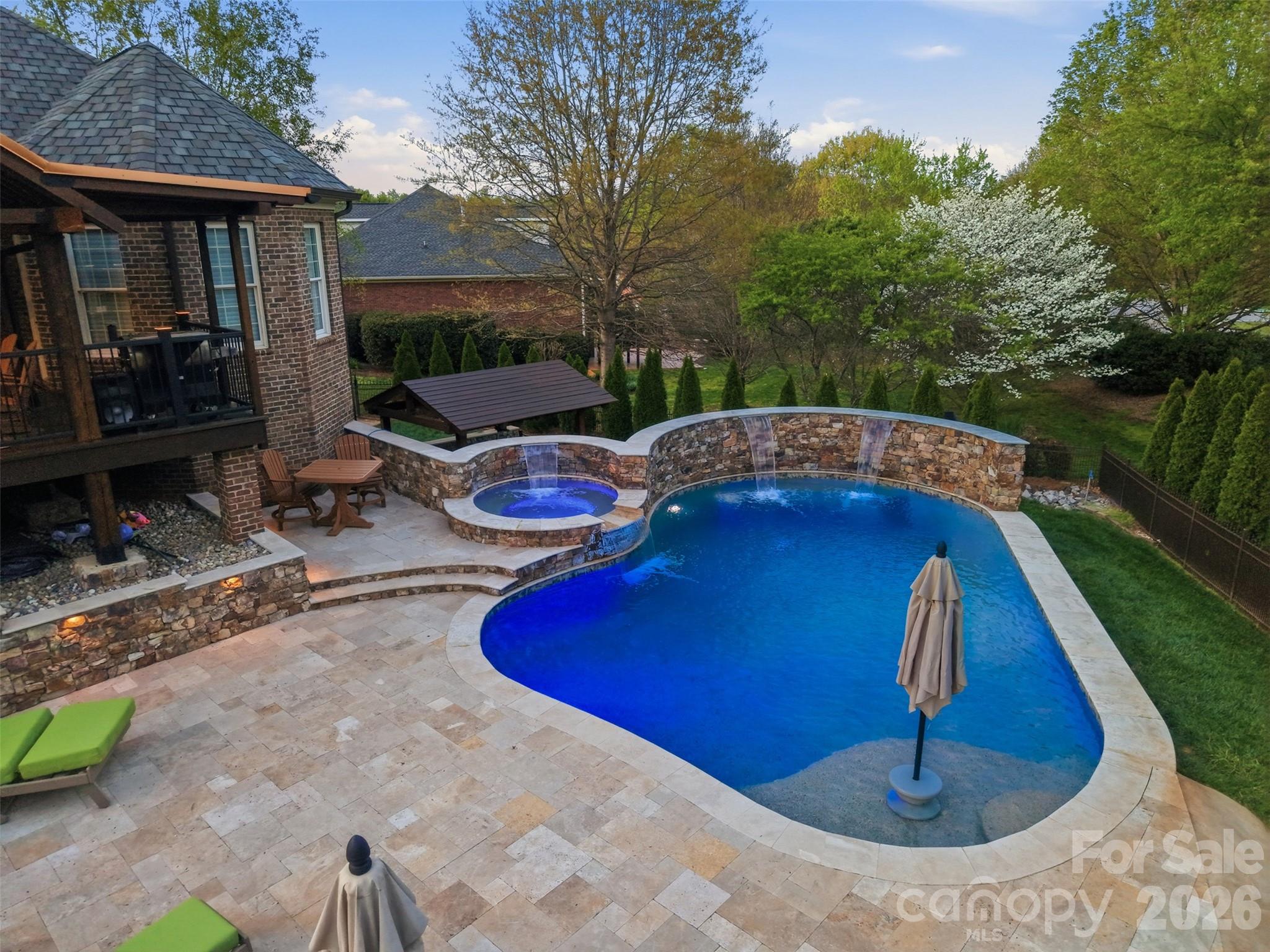 3638 Hogan Court Conover, NC 28613 - Photo 35 of 38 a view of backyard with swimming pool and outdoor seating
