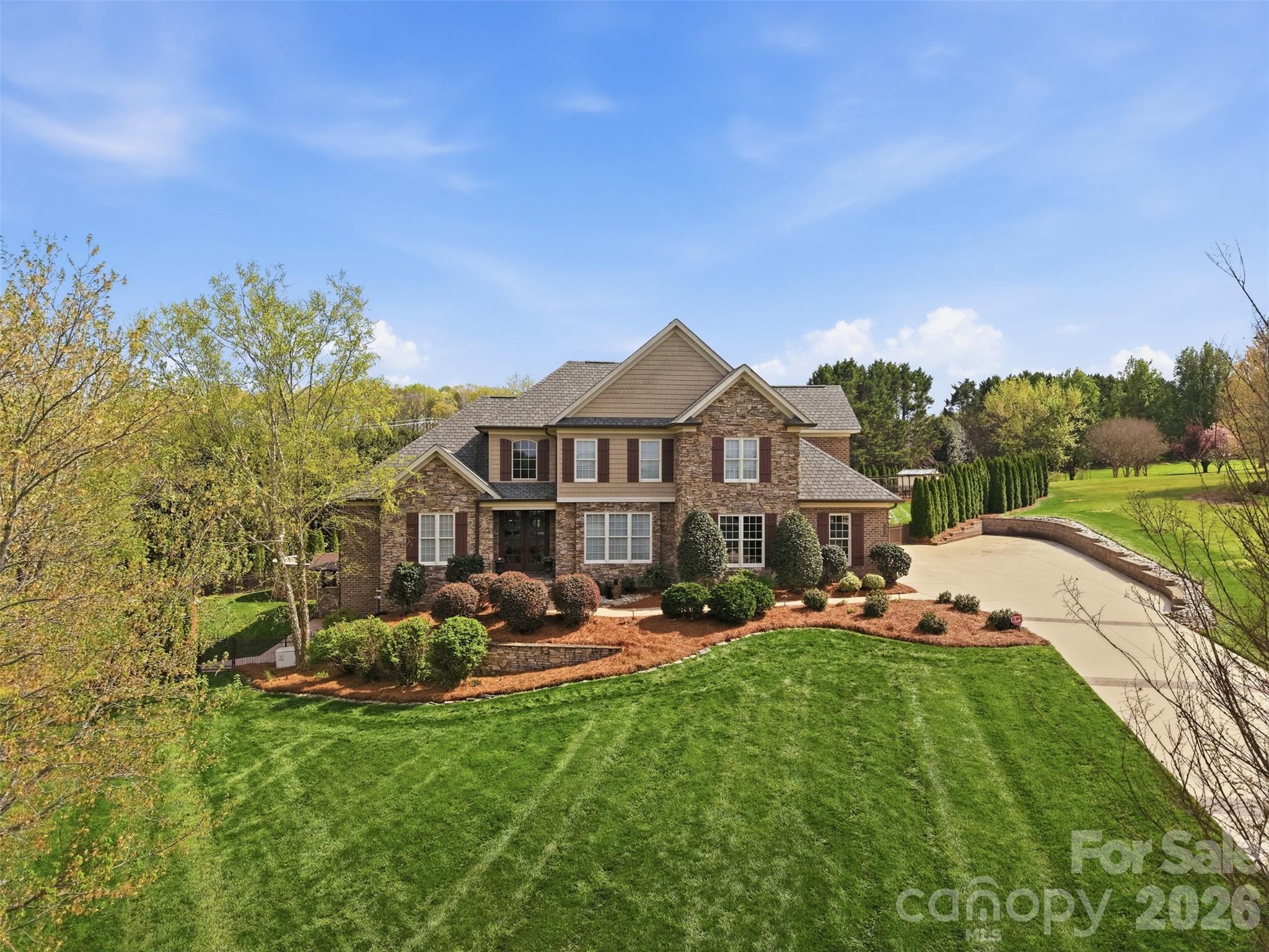 3638 Hogan Court Conover, NC 28613 - Photo 5 of 38 a front view of a house with garden