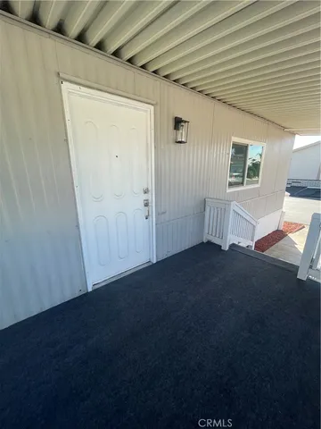 a view of livingroom and hardwood floor