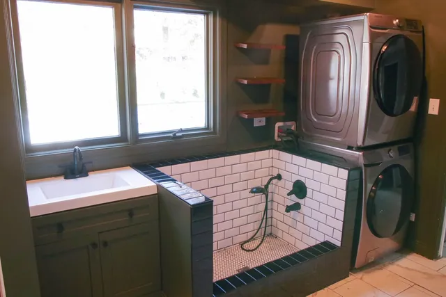 a bathroom with a sink and a mirror