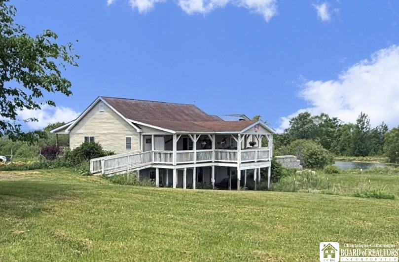 1546 Swede Road Harmony, NY 14710 - Photo 4 of 50 View of back deck...pond in the background