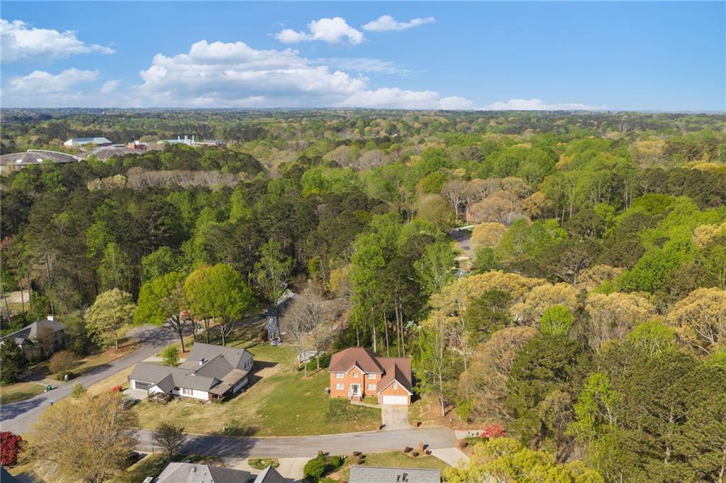 835 Lockriver Way Lawrenceville, GA 30044 - Photo 47 of 68 an aerial view of residential houses with outdoor space