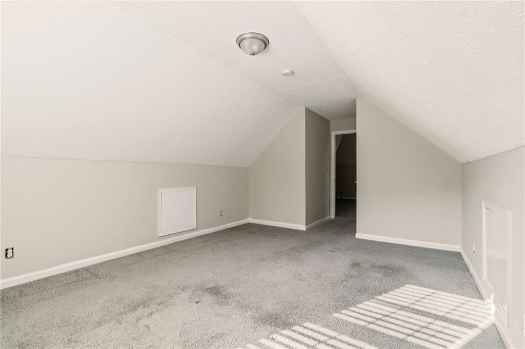 835 Lockriver Way Lawrenceville, GA 30044 - Photo 64 of 68 a view of an empty room