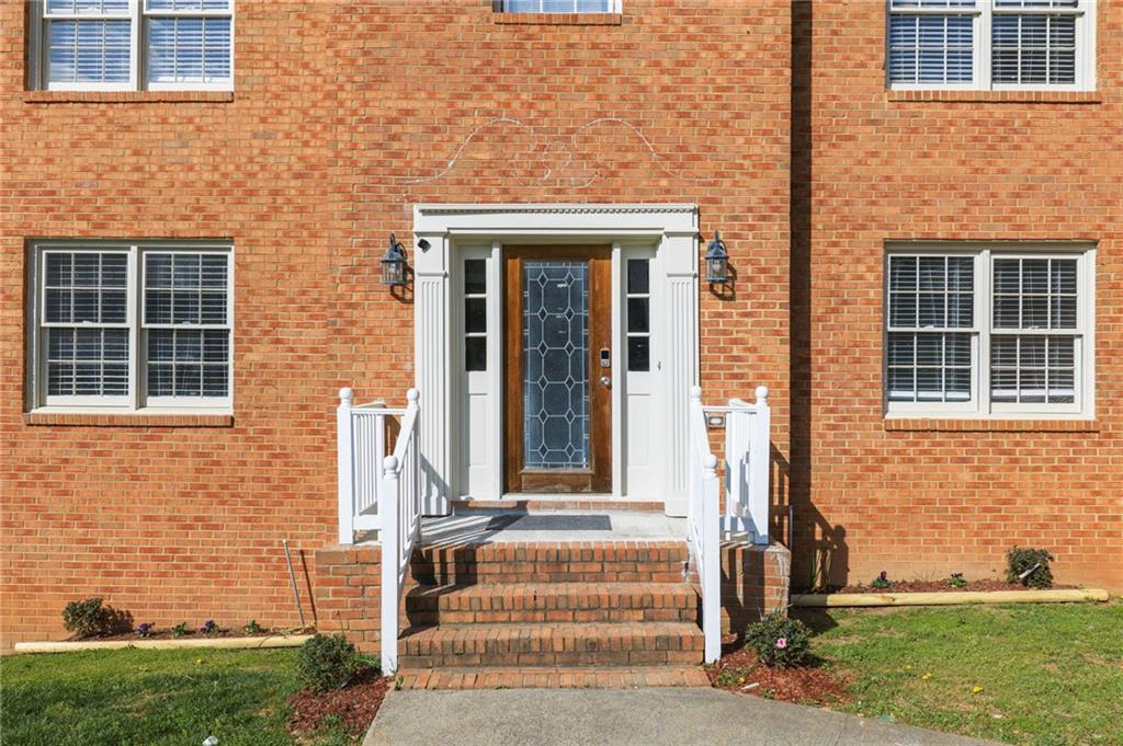 835 Lockriver Way Lawrenceville, GA 30044 - Photo 68 of 68 a front view of a house with a yard