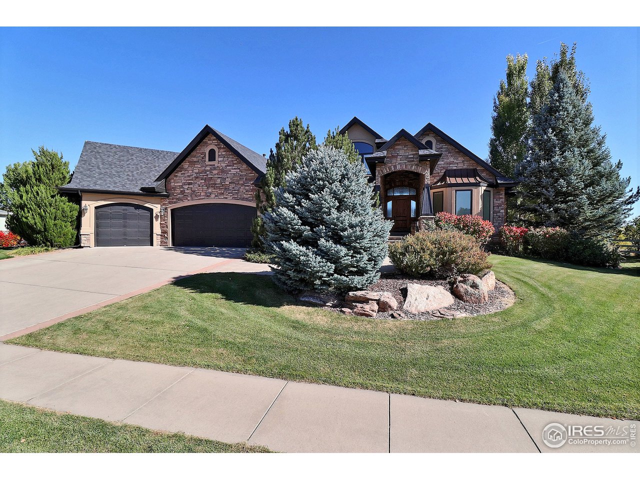 6320 Westchase Road Fort Collins, CO 80528 - Photo 1 of 40 Everything you are looking for in this luxurious custom home.