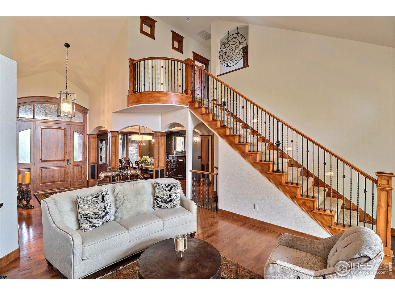 6320 Westchase Road Fort Collins, CO 80528 - Photo 14 of 40 Grand stairway to the upstairs.