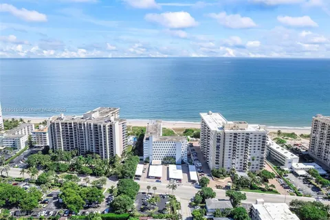 a view of a city with tall buildings