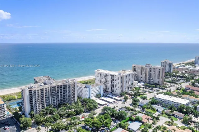 a view of a city with tall buildings in the background