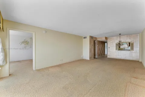 an empty room with window