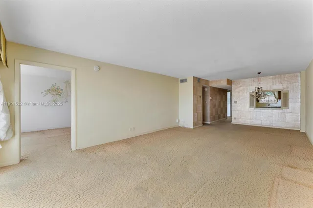 an empty room with window