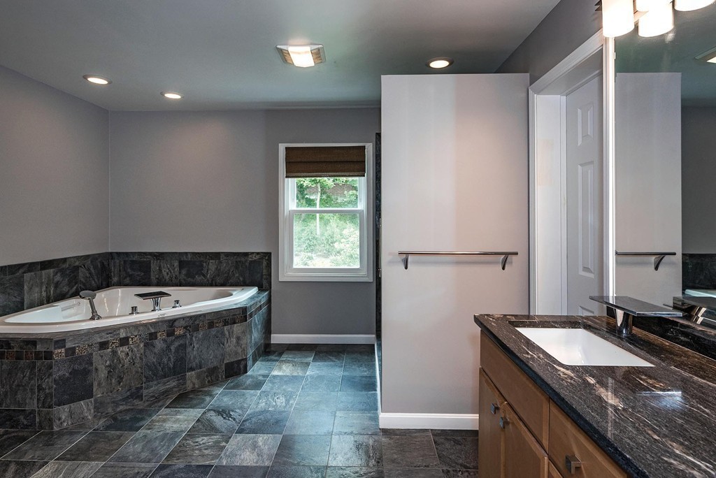 200 Country Club Road Newton, MA 02459 - Photo 8 of 12 a bathroom with a granite countertop sink a toilet and bathtub