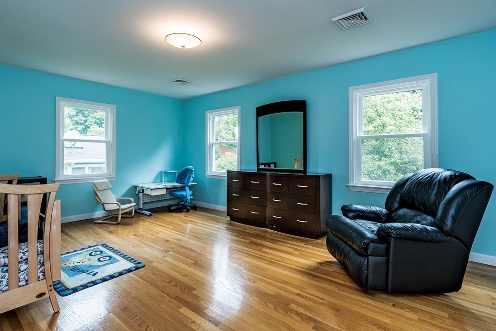 200 Country Club Road Newton, MA 02459 - Photo 10 of 12 a living room with furniture and a wooden floor