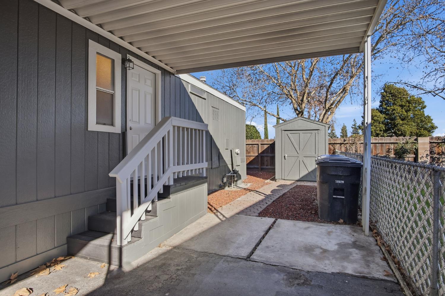 1428 Playground Way Modesto, CA 95355 - Photo 22 of 29 a view of entryway with wooden stairs