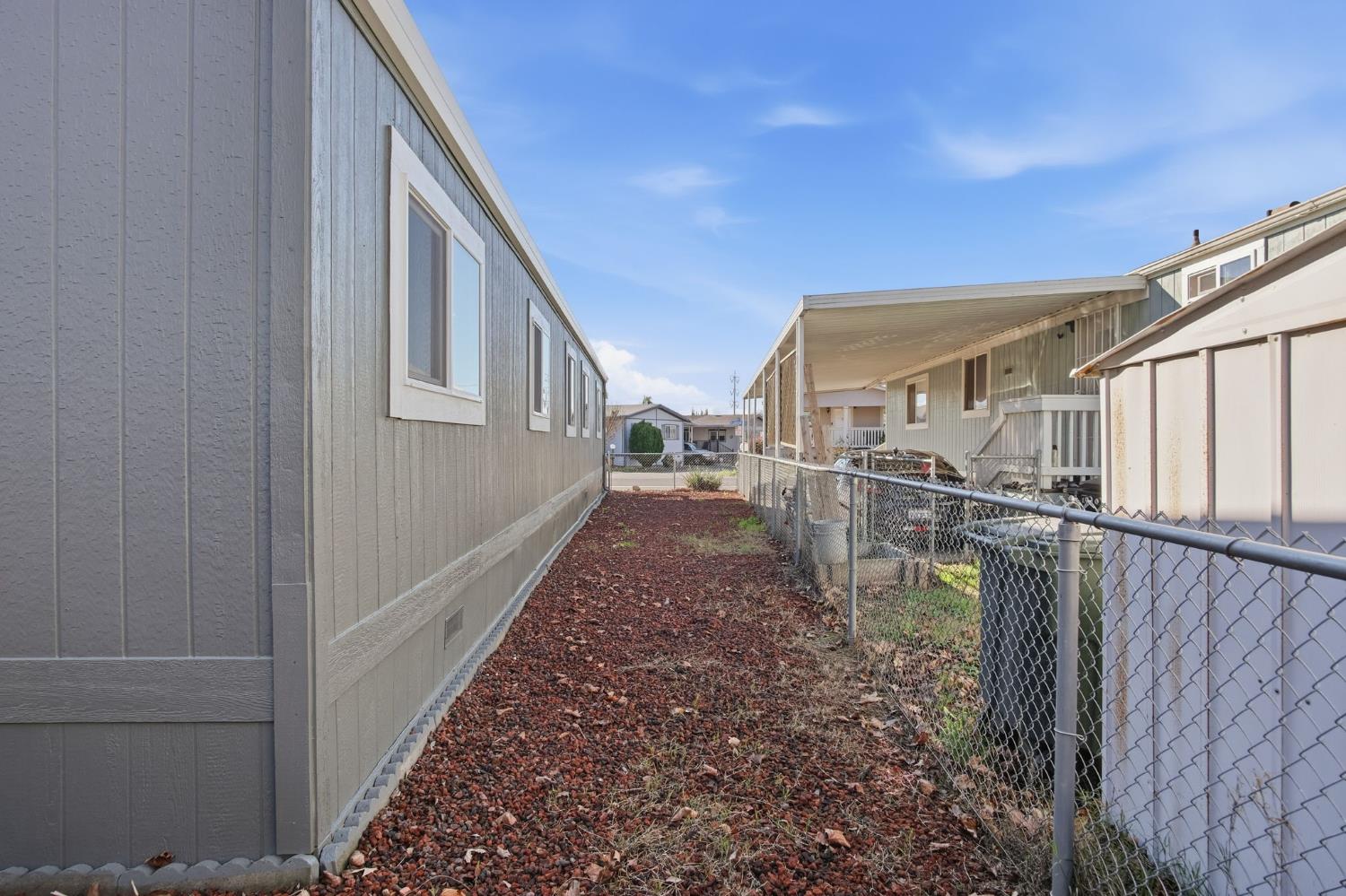 1428 Playground Way Modesto, CA 95355 - Photo 23 of 29 a view of a house with a backyard