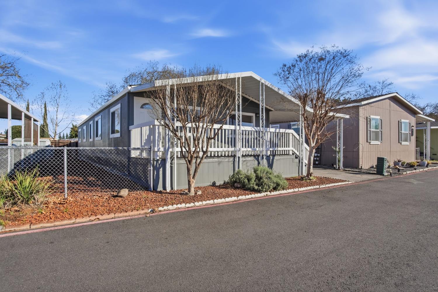1428 Playground Way Modesto, CA 95355 - Photo 3 of 29 a view of a house with a street