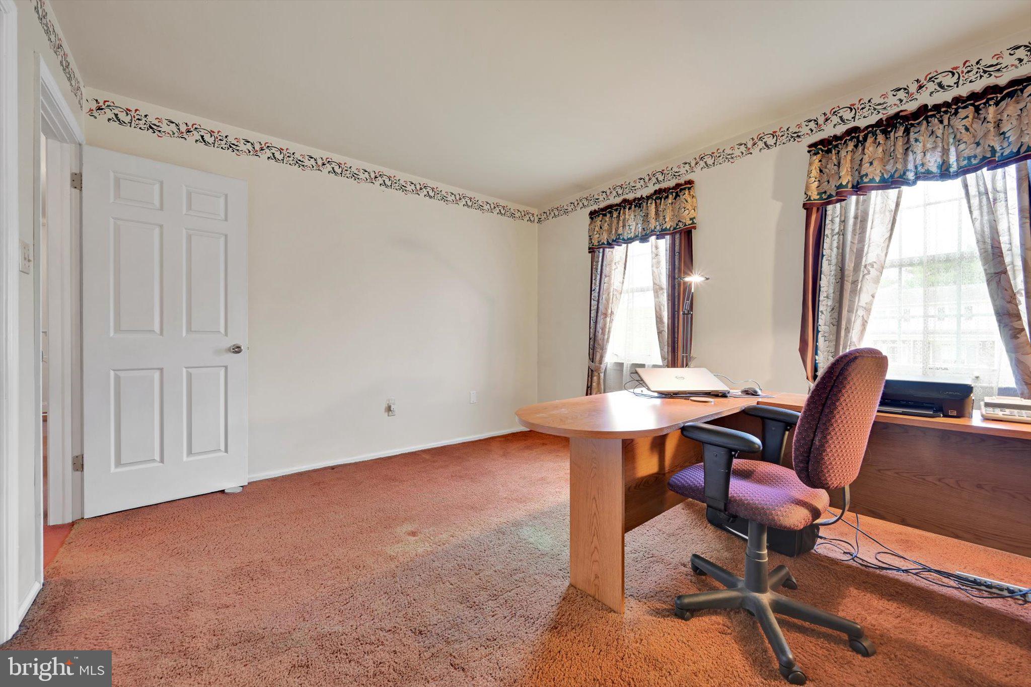 1546 Singer Road Wyomissing, PA 19610 - Photo 23 of 40 a view of a workspace with furniture and a window