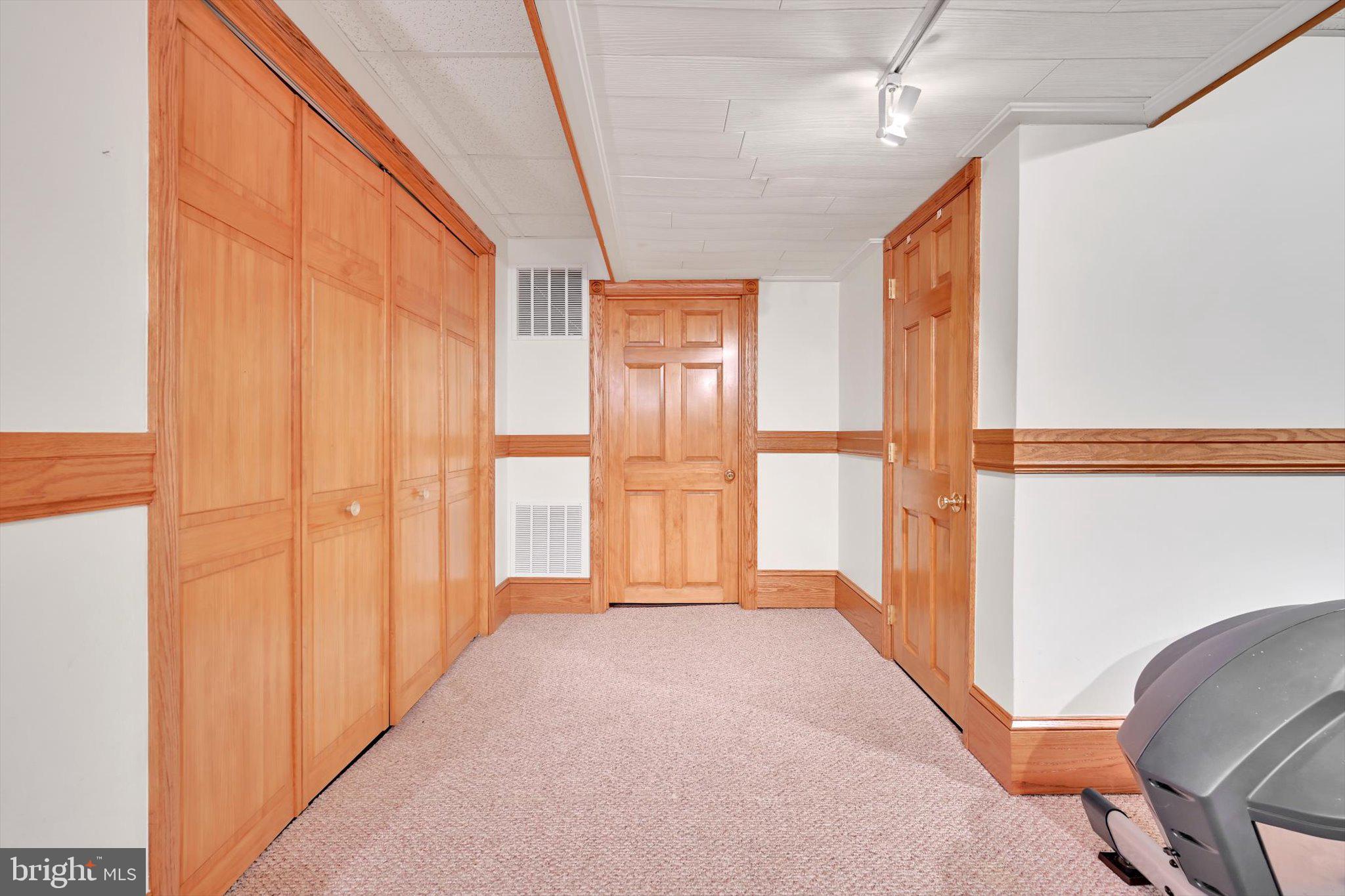 1546 Singer Road Wyomissing, PA 19610 - Photo 29 of 40 a view of a room with wooden floor and windows