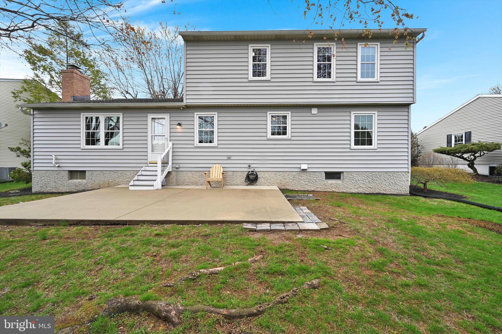1546 Singer Road Wyomissing, PA 19610 - Photo 32 of 40 a view of a house with a yard and sitting area