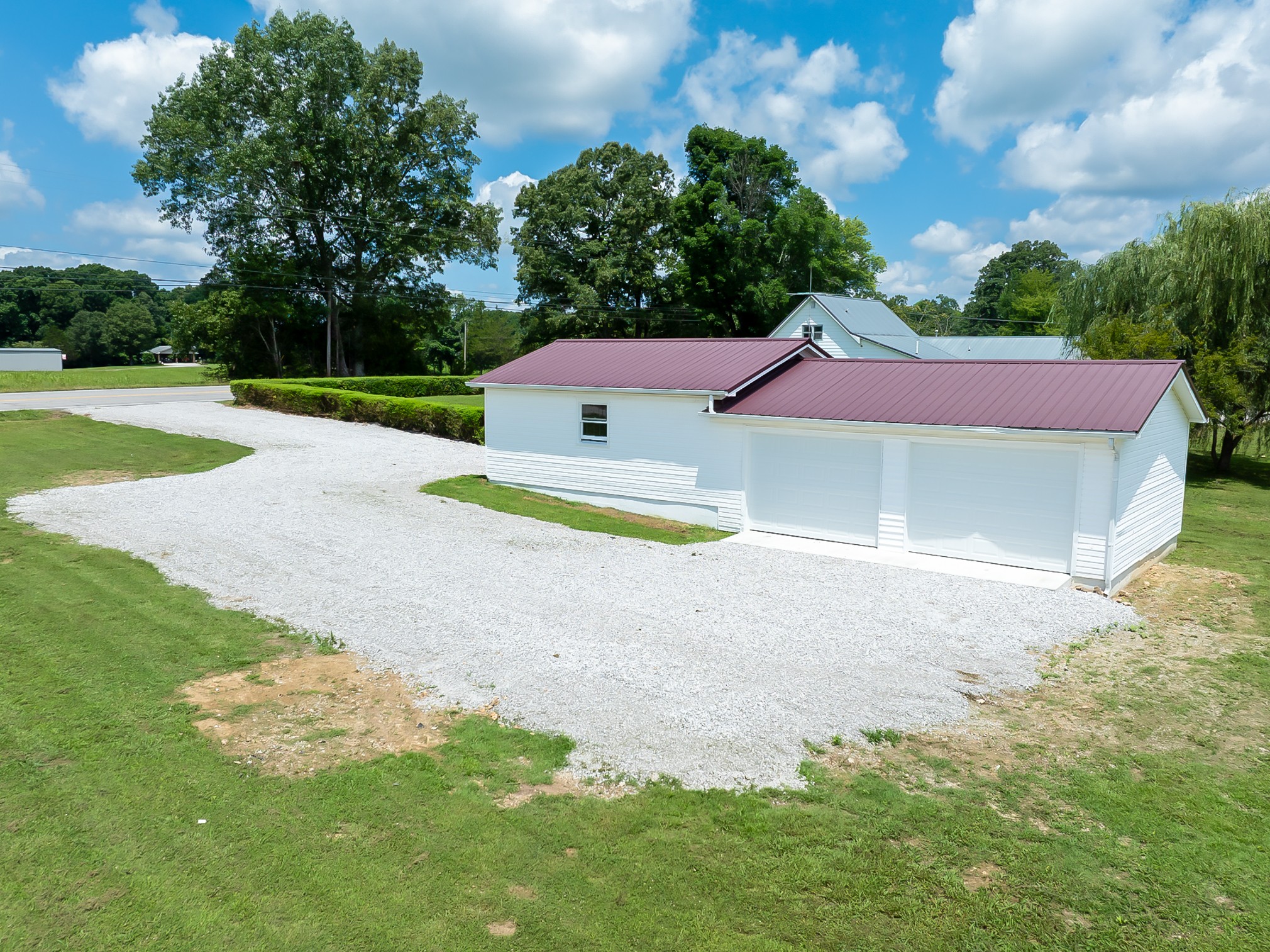 6606 Old Tullahoma Road Winchester, TN 37398 - Photo 37 of 42 a aerial view of a house with swimming pool and trees in the background