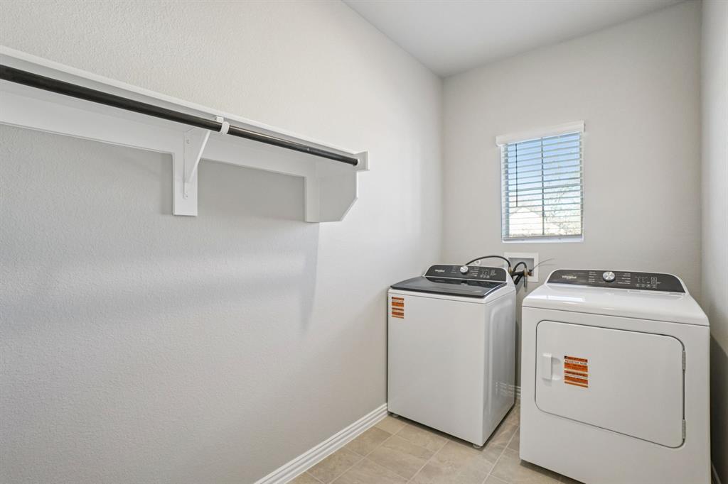 822 Sunflower Road Lavon, TX 75166 - Photo 19 of 38 a utility room with dryer and washer