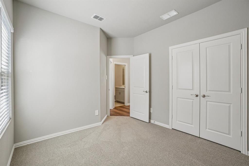 822 Sunflower Road Lavon, TX 75166 - Photo 24 of 38 a view of an empty room and closet area
