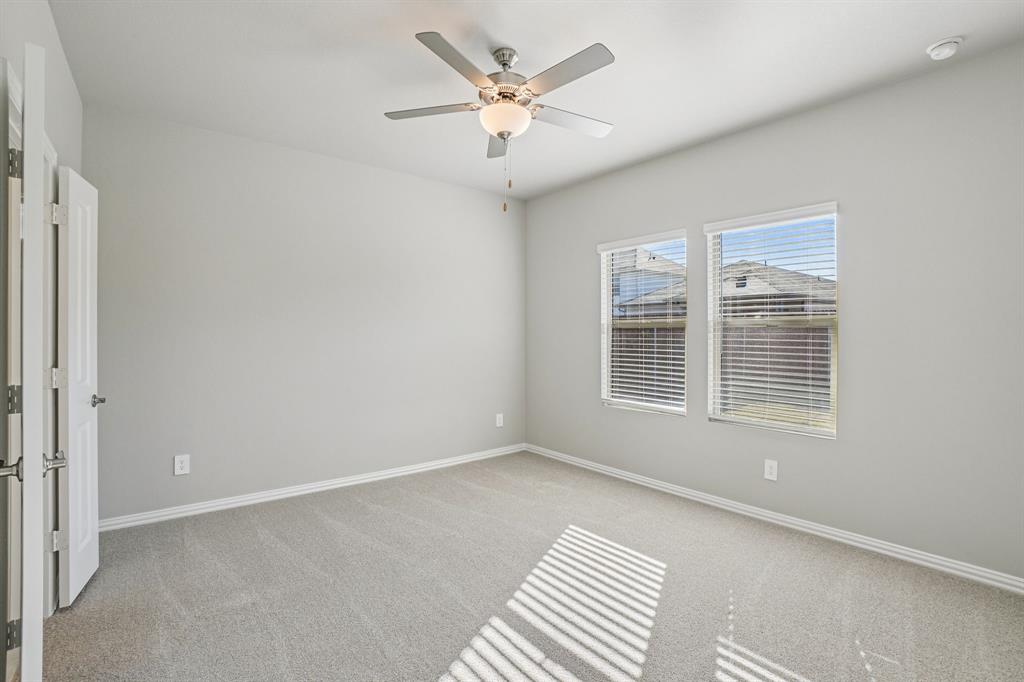 822 Sunflower Road Lavon, TX 75166 - Photo 25 of 38 a view of an empty room with a window