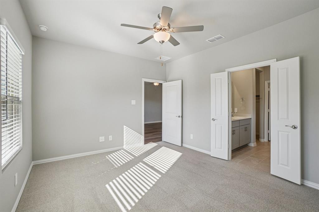 822 Sunflower Road Lavon, TX 75166 - Photo 26 of 38 a view of an empty room with a window