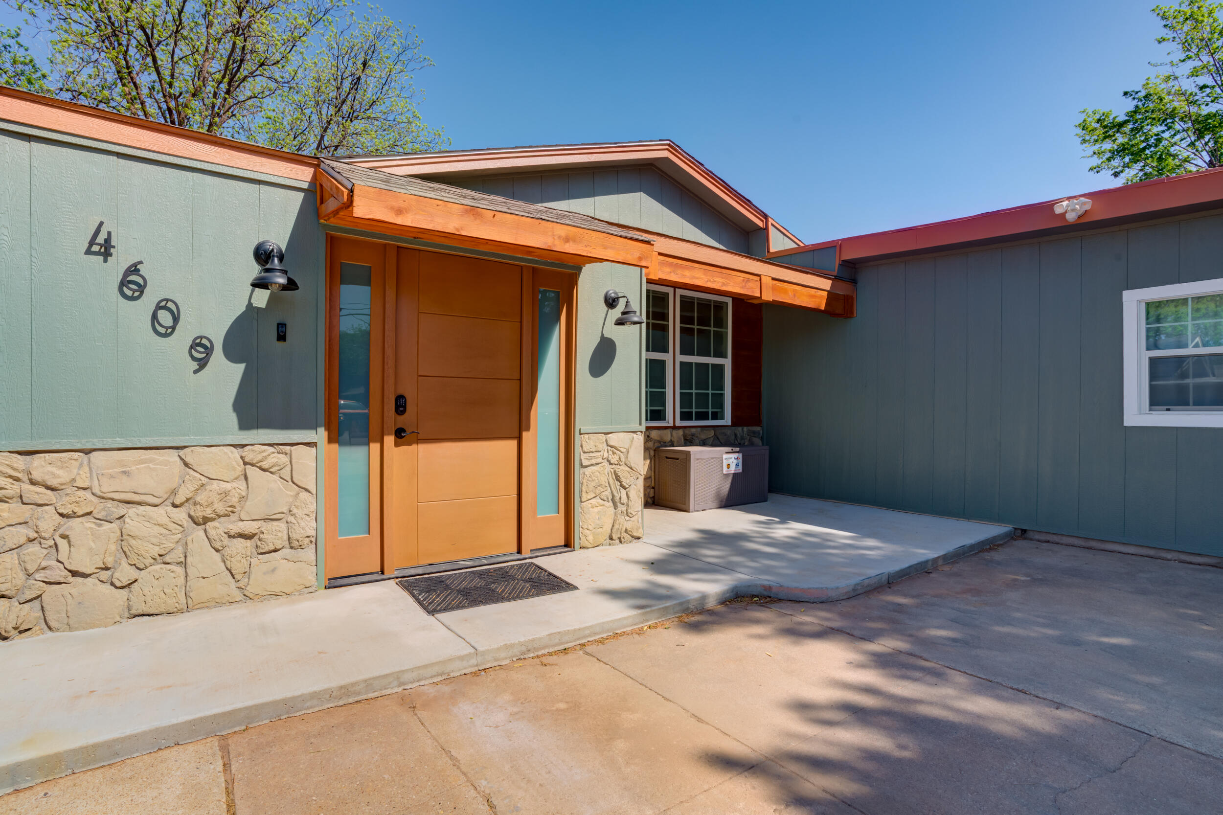 4609 Elgin Avenue Lubbock, TX 79413 - Photo 2 of 46 a front view of a house with a yard
