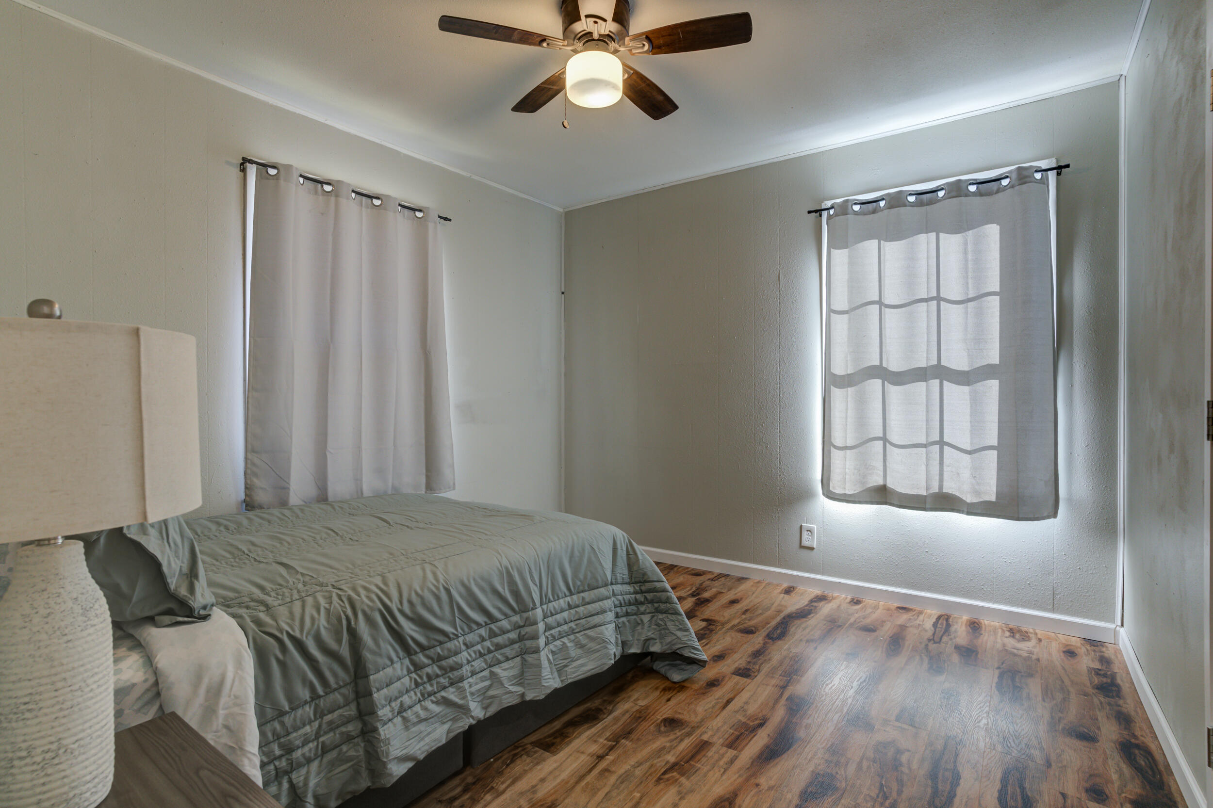 4609 Elgin Avenue Lubbock, TX 79413 - Photo 29 of 46 a bedroom with a bed and window