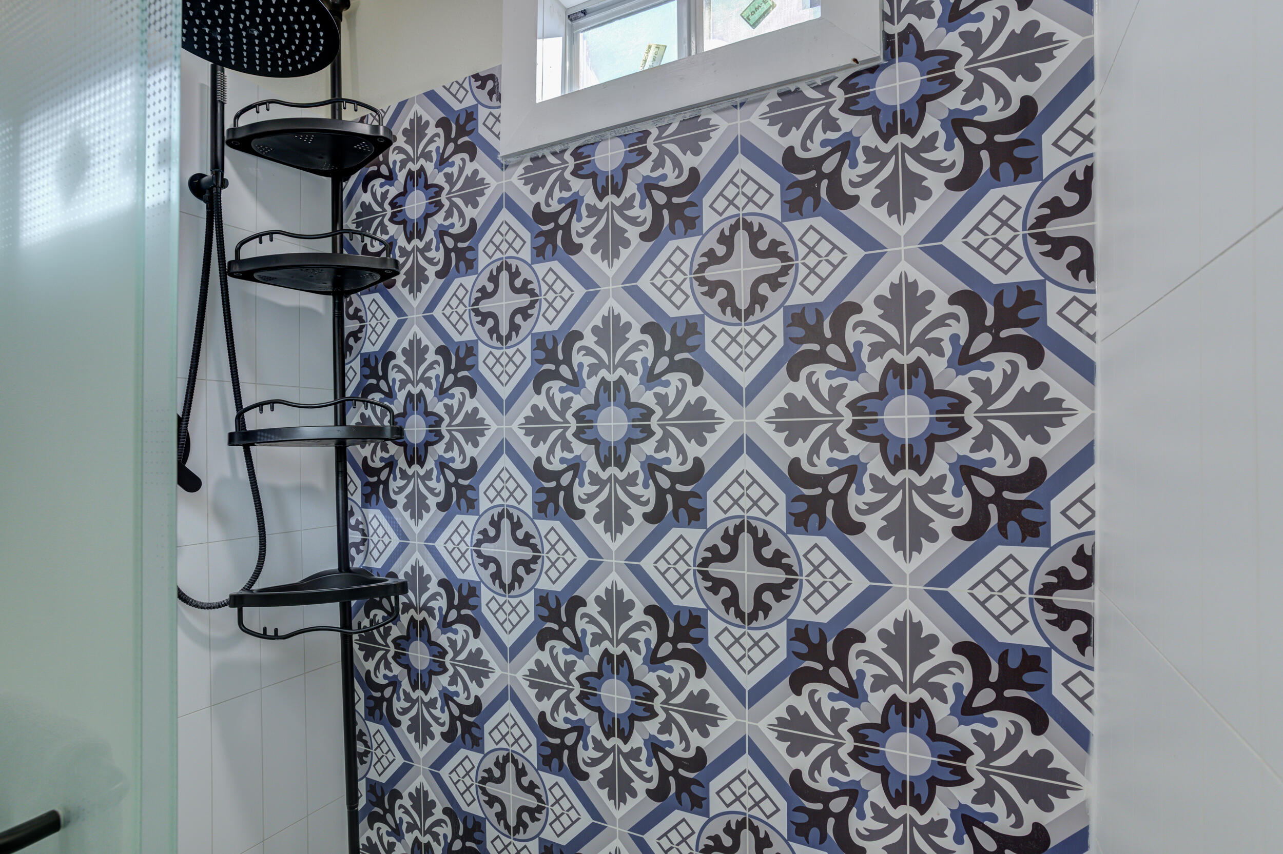 4609 Elgin Avenue Lubbock, TX 79413 - Photo 40 of 46 a bathroom with a shower curtain