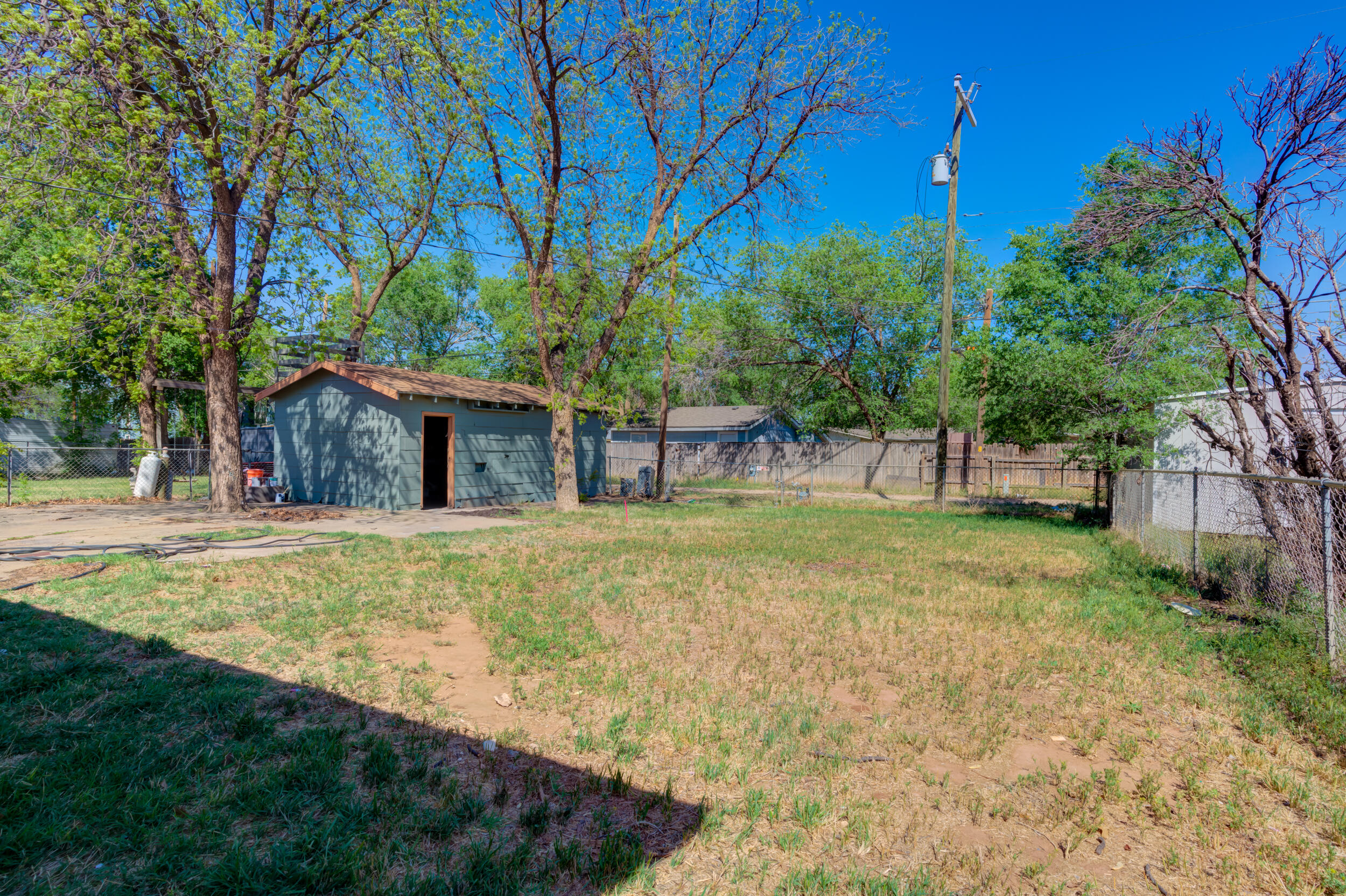 4609 Elgin Avenue Lubbock, TX 79413 - Photo 42 of 46 a view of house with outdoor space and garden