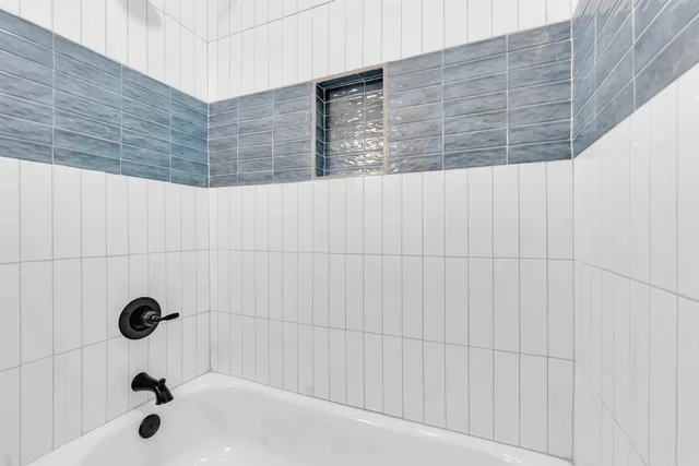 a bathroom with a bathtub